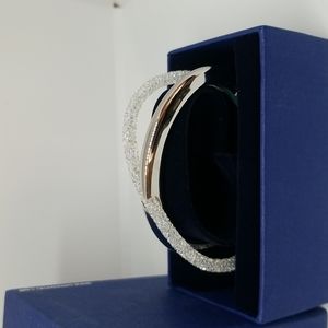 Swarovski Crystaldust cross cuff bracelet never worn in box.